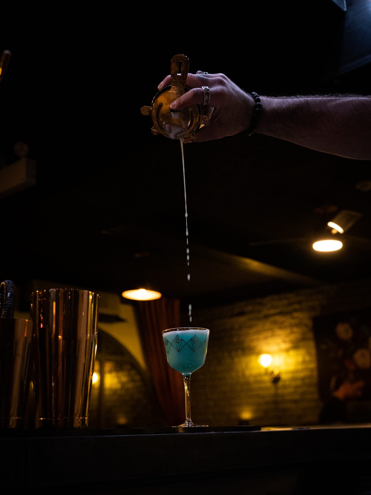 A cocktail being poured